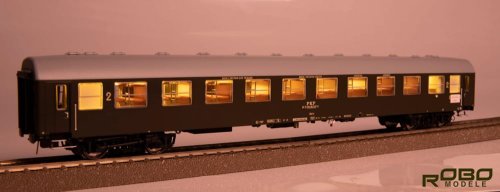 Go to product ROBO 244051 H0 - Wagon kuszetka 110Ac 2 kl. PKP Warszawa z oświetleniem